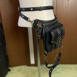 Side saddle bag with metal embellishments